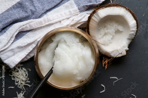 Top down view of Coconut oil, coconut flakes