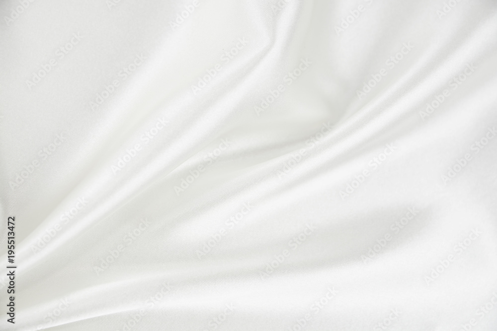 The texture of the satin fabric of white color for the background  