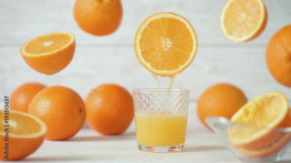 Cinemagraph - Pouring the orange juice into a glass. Nobody. Motion Photo. Cinemagraph - Pouring the orange juice into a glass. Nobody. Motion Photo.