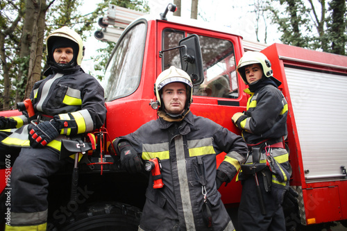 Firemen wearing uniforms © olly