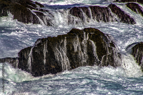 Waves Over Rocks