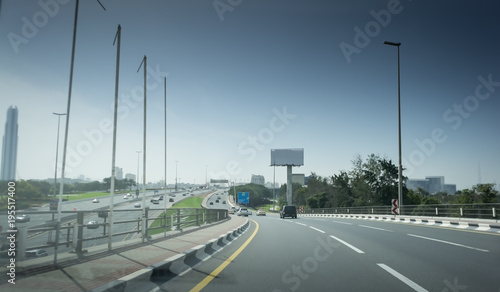 Wallpaper Mural New asphalt road in a modern city. Cars on the highway Torontodigital.ca