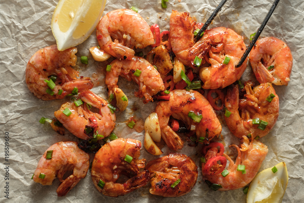 Large grilled BBQ shrimp with sweet chili sauce, green onion and lemon. Large grilled BBQ shrimp with sweet chili sauce, green onion and lemon.