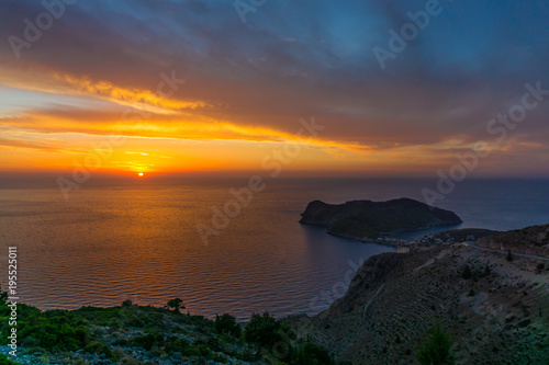 Panoramic colorful sunset view in Assos peninsula of Cephalonia Greece