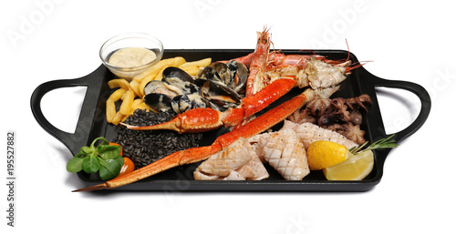 Delicious seafood platter on white background photo