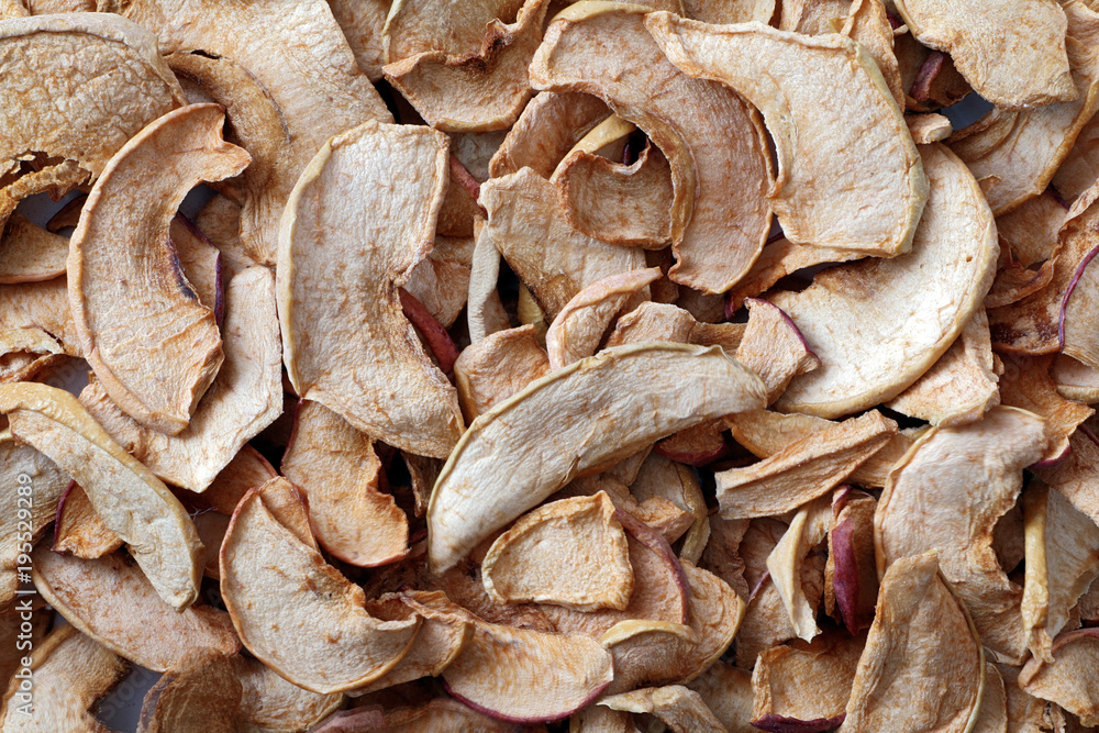Background of sliced dried apples. Dried fruits. Background of sliced dried apples. Dried fruits.