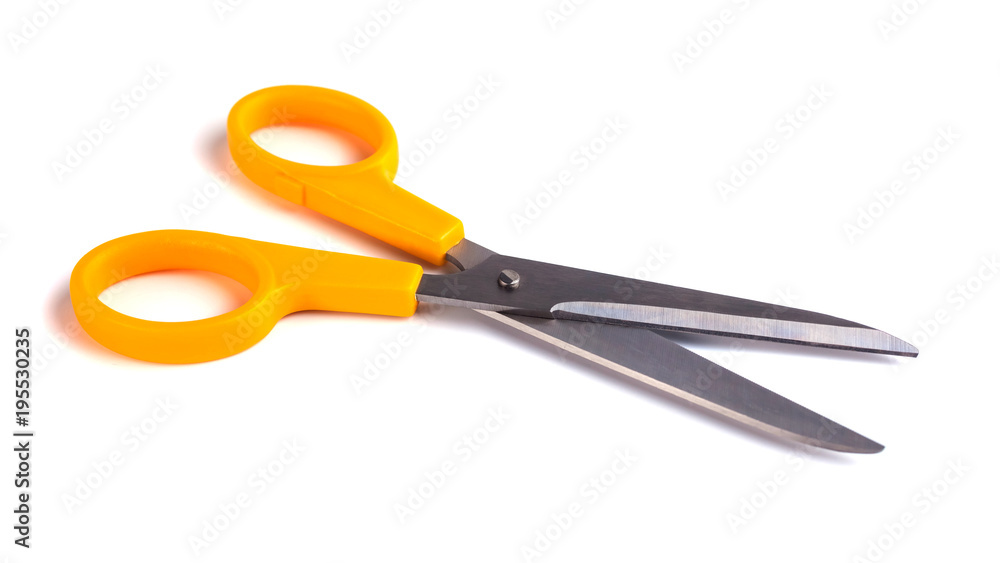 Yellow scissors isolated on a white background Yellow scissors isolated on a white background