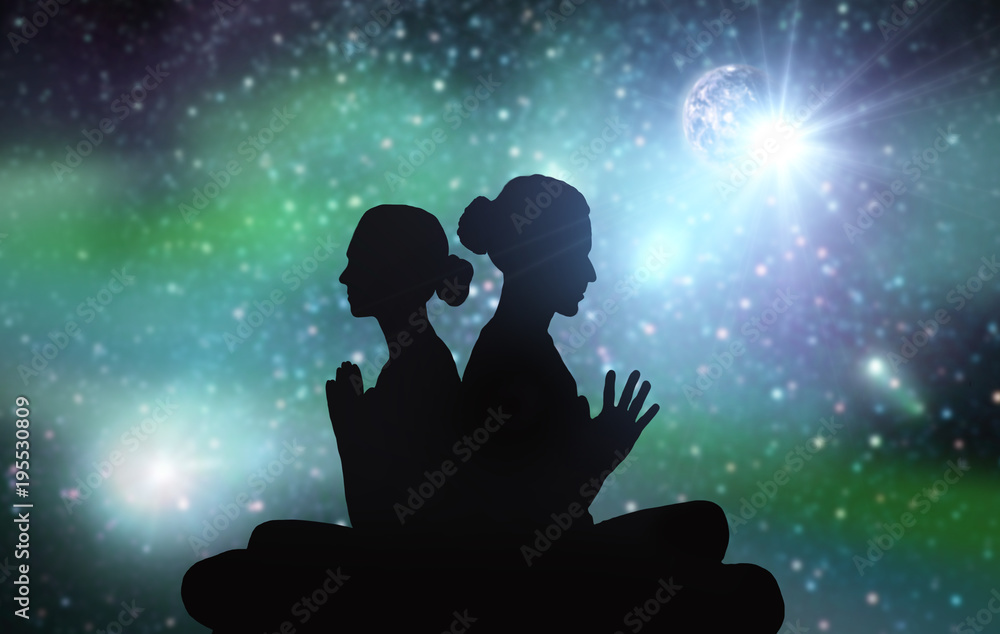 black silhouette of couple meditating over space