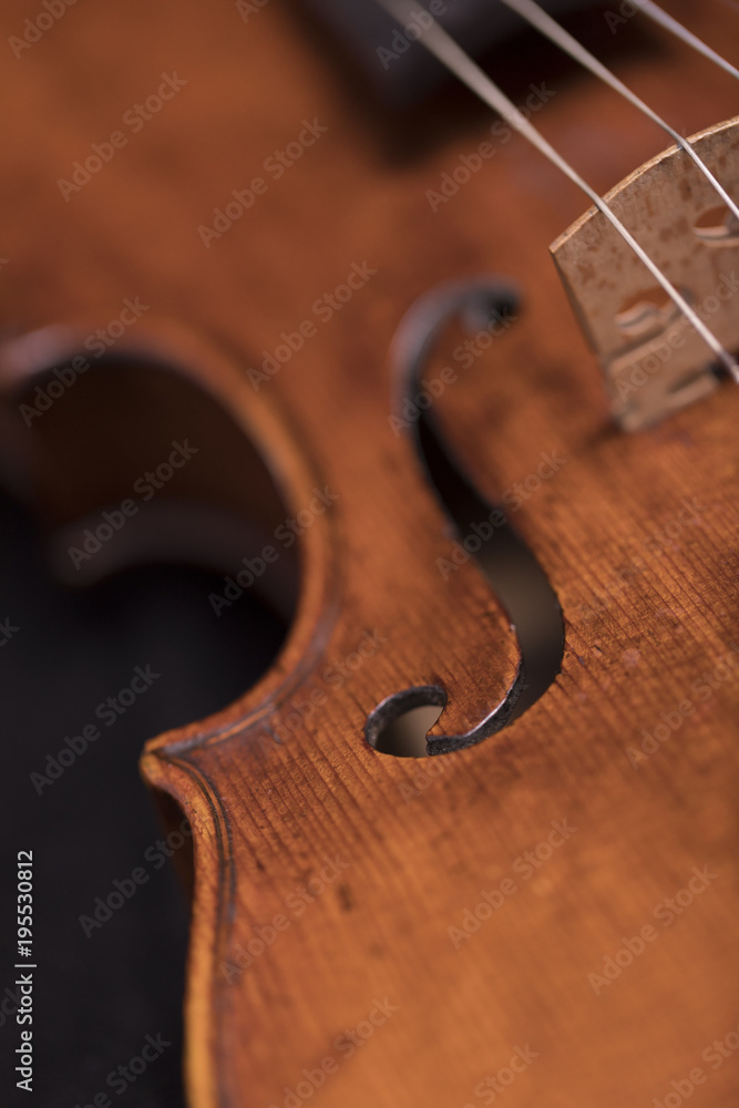A violin on a dark background