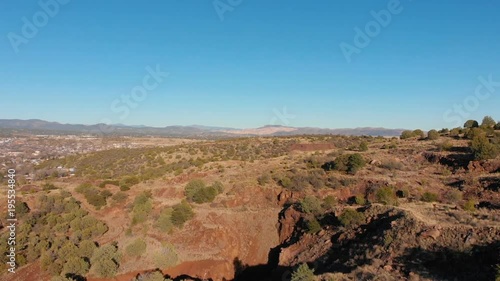 Aerial shot of some beautiful foothills hiking trails in a small mountain town 