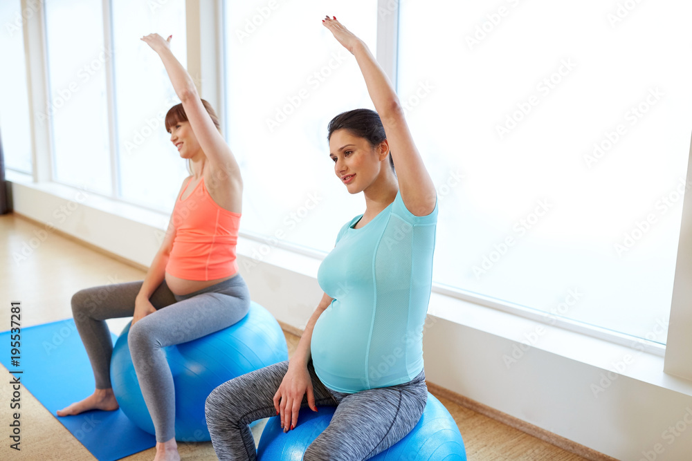 pregnant women training with exercise balls in gym pregnant women training with exercise balls in gym