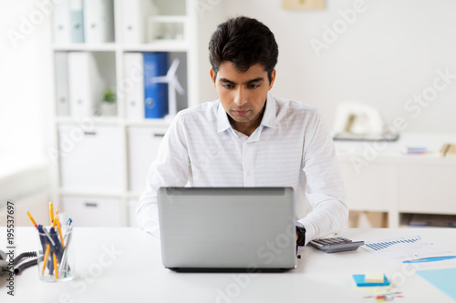 businessman with laptop working at office