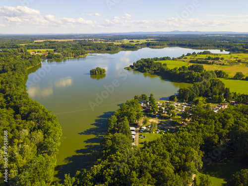 Opatovicky rybnik (Opatovicky pond) with camping site near Trebon in South Bohemia, Czech republic, European union. Famous tourist destination with many landmarks and ponds around. © peteri