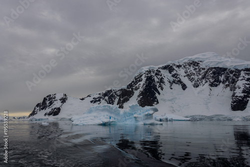 Antarctic landscape with icebergs and reflection © Alexey Seafarer