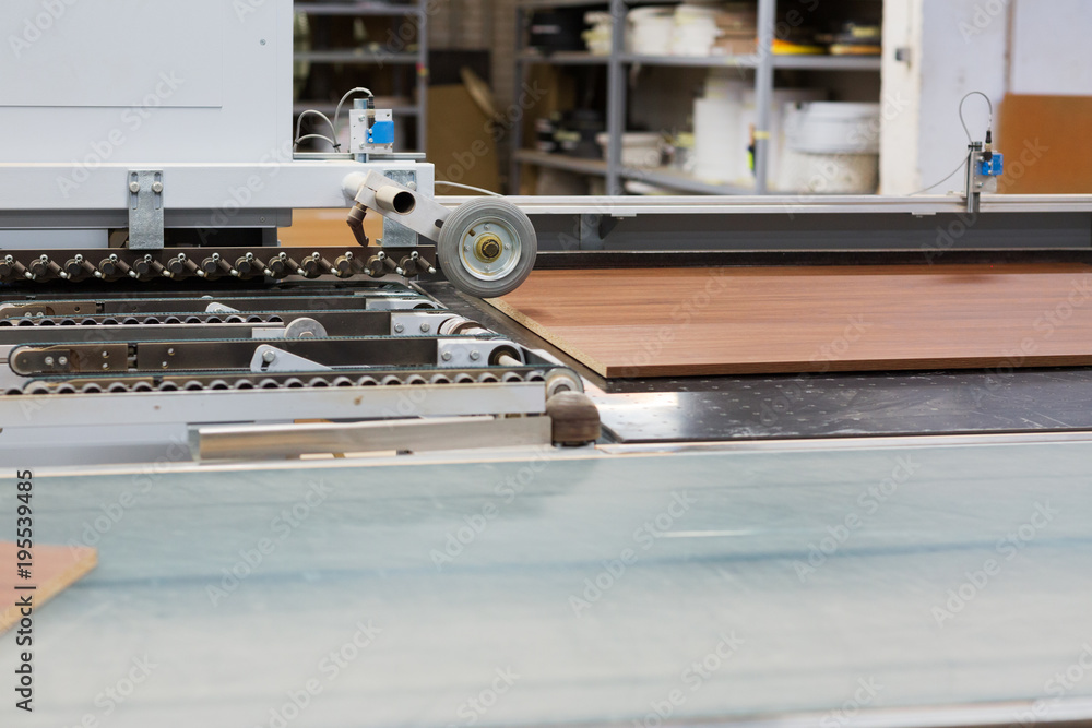 chipboards on conveyer at furniture factory chipboards on conveyer at furniture factory