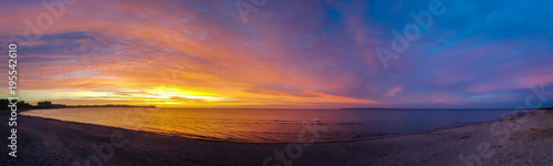 a perfect sunrise at a empty beach