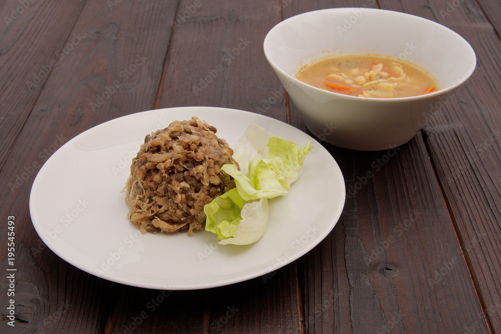 Buckwheat and lentils with tempeh on a background