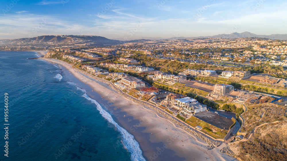 Aerial view of Southern California beach in Dana Point, Orange County on a sunny afternoon.