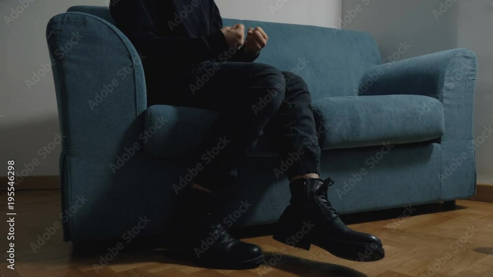 Man Sitting On Sofa Talking To His Therapist.depression, anxiety, panic Man Sitting On Sofa Talking To His Therapist.depression, anxiety, panic
