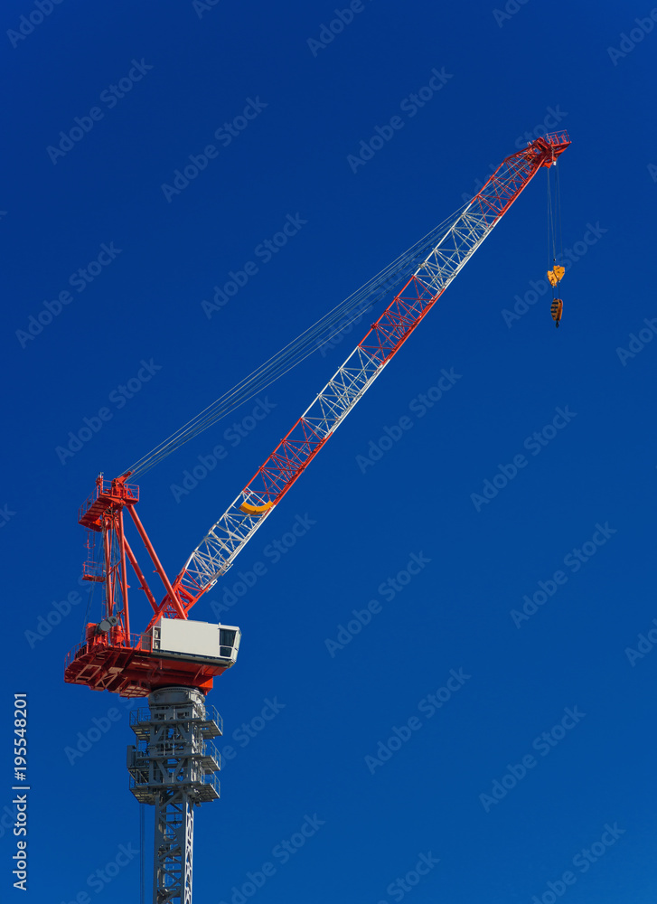 Construction fixed crane with cabin at work Construction fixed crane with cabin at work