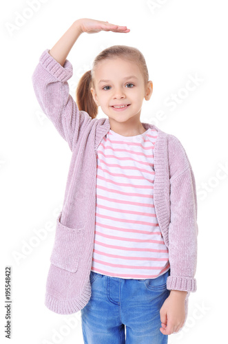 Little girl measuring heigh...