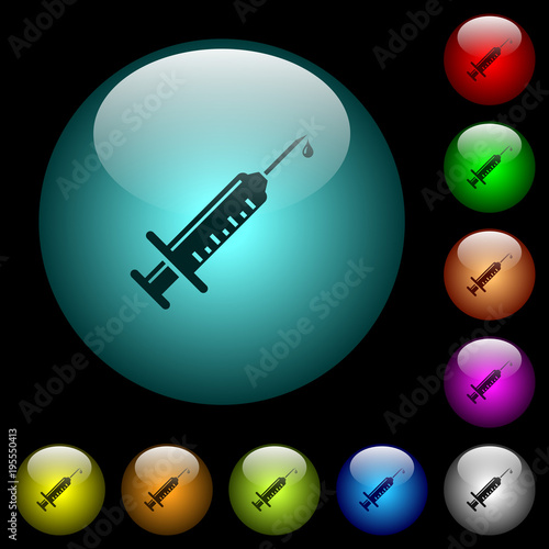 Syringe with drop icons in color illuminated glass buttons