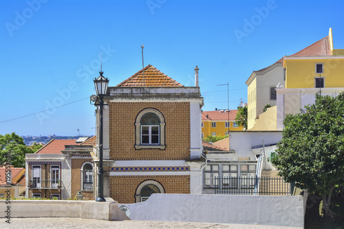 Colourful streets of Alfama district in Lisbon photo