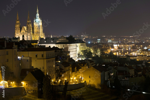 Winter night Prague City with gothic Castle, Czech Republic