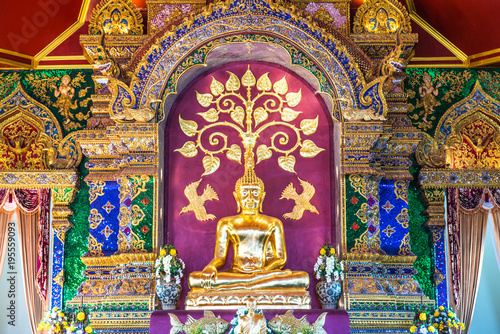 Beautiful Buddha statue at Prayodkhunpol Wiang Kalong temple photo