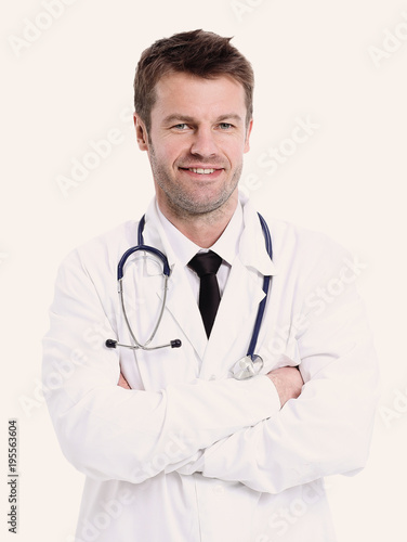 Portrait of confident medical doctor on white background © ASDF
