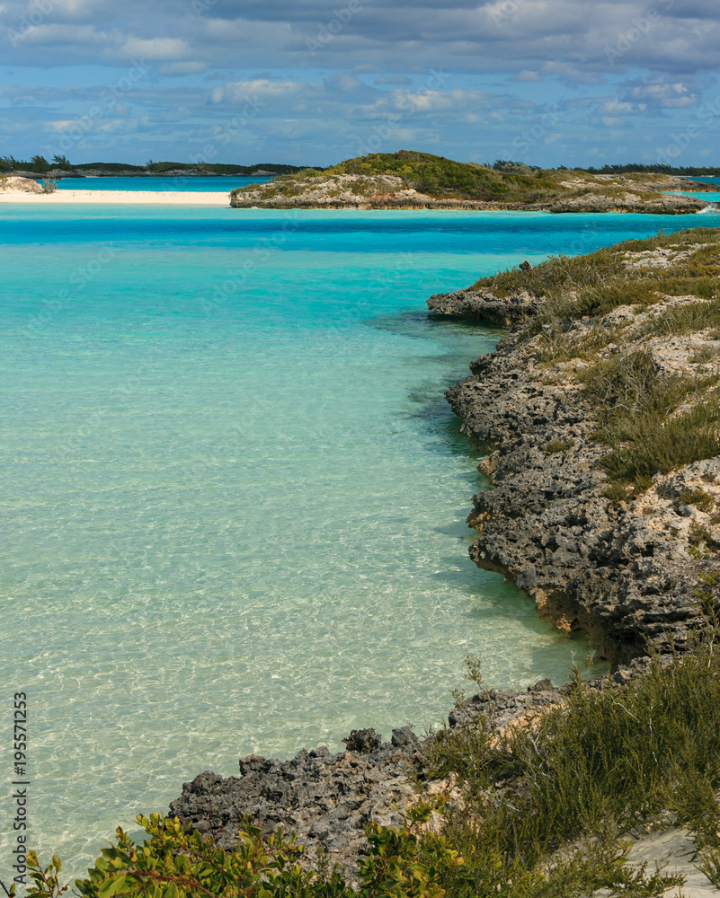 A beautiful beach bay in the Exumas island chain in the Bahamas. A beautiful beach bay in the Exumas island chain in the Bahamas.