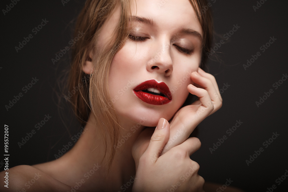 Beauty face of young woman, red lips make-up, clean skin. Beauty face of young woman, red lips make-up, clean skin.