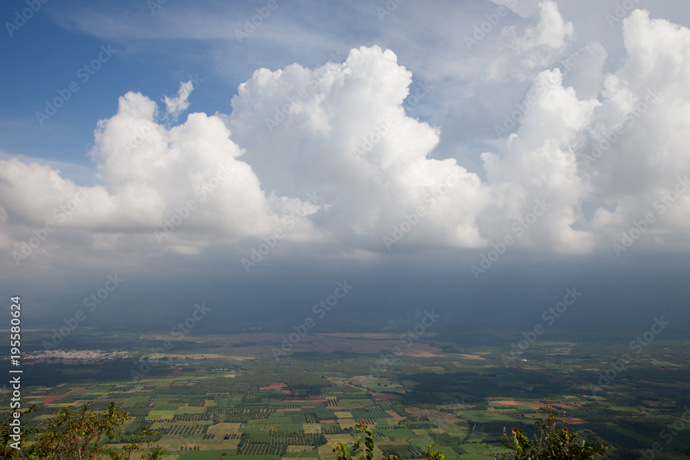 Naklejka premium Clouds Over Gudalur, India