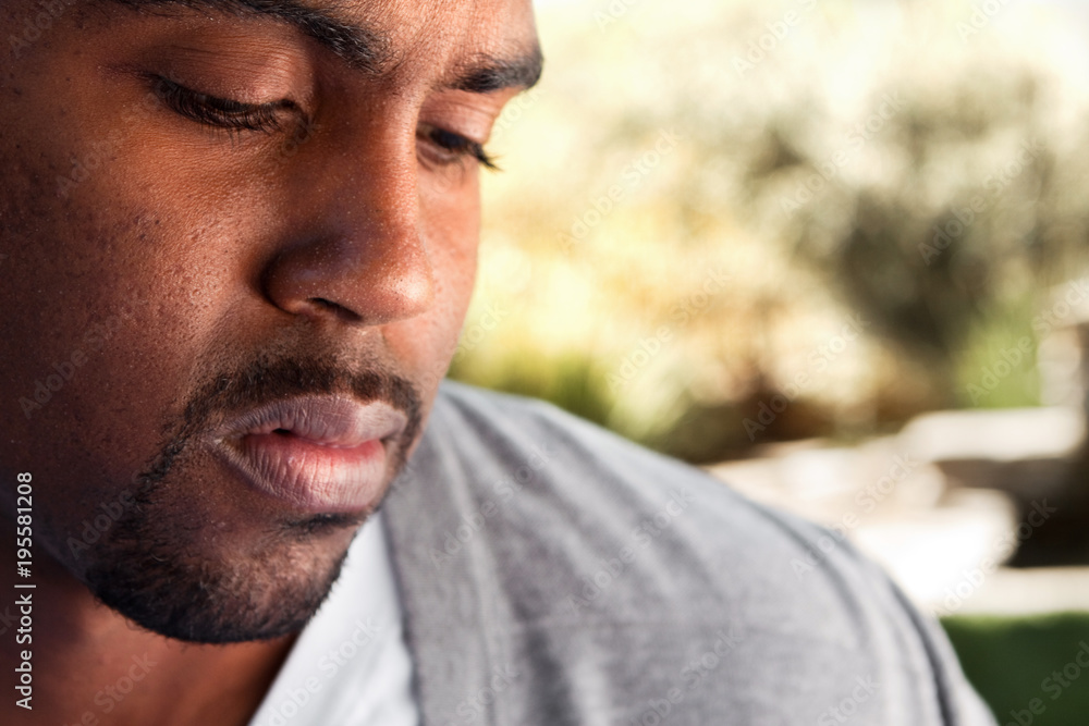 Young African American man looking sad. Young African American man looking sad.