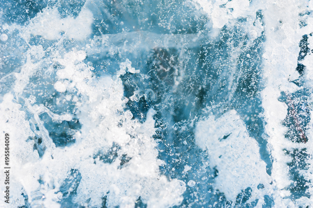 Ice on the frozen lake. Macro image, selective focus.