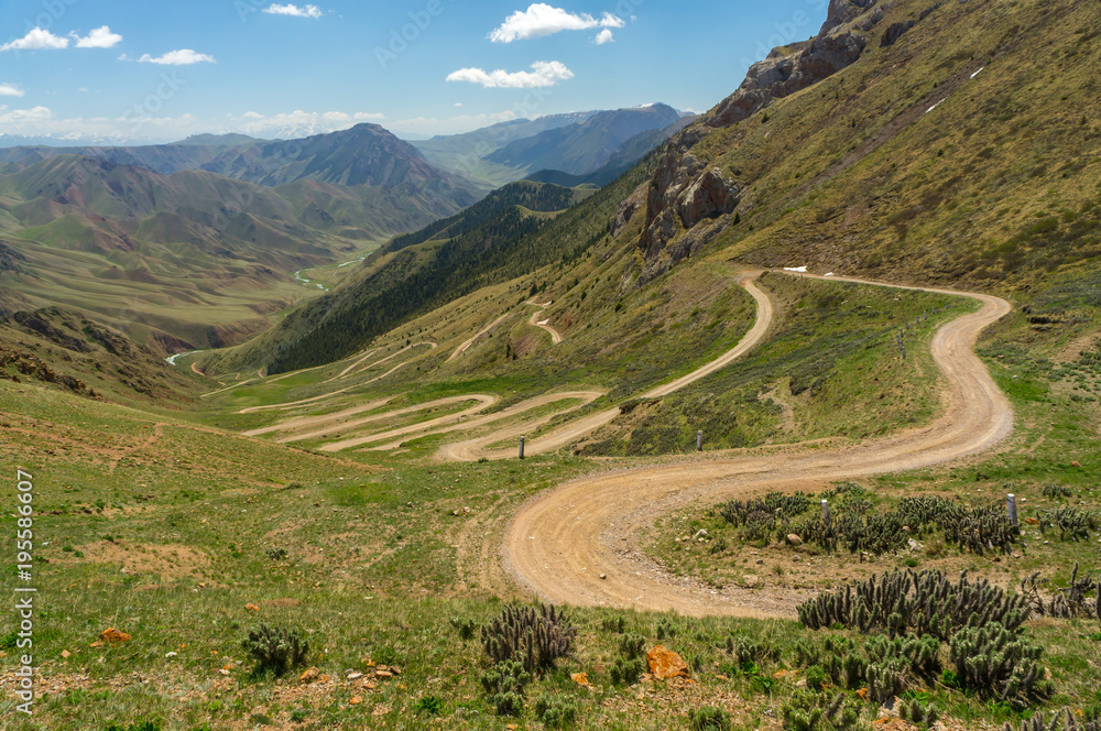 The mountain road goes down the mountain gorge