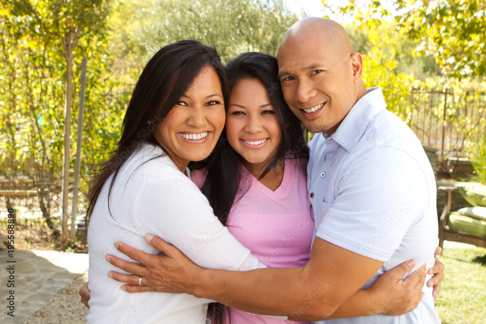 Fototapeta premium Happy Asian Family Hugging