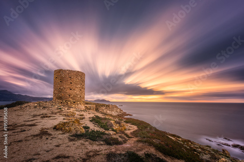 Fototapeta Dramatic sunset at Punta Spanu on the coast of Corsica