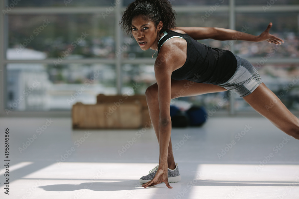 Healthy african woman working out in gym Healthy african woman working out in gym