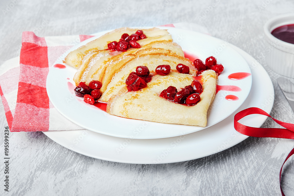 Russian pancakes with cornelian cherry jam. Russian pancakes with cornelian cherry jam.