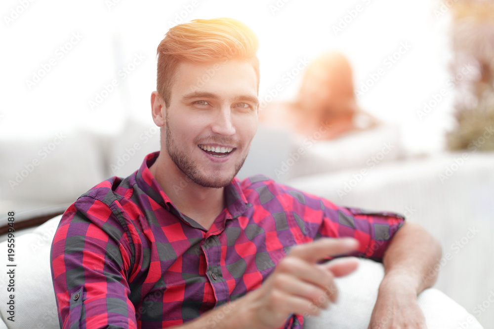 closeup of happy young man showing forward, closeup of happy young man showing forward,