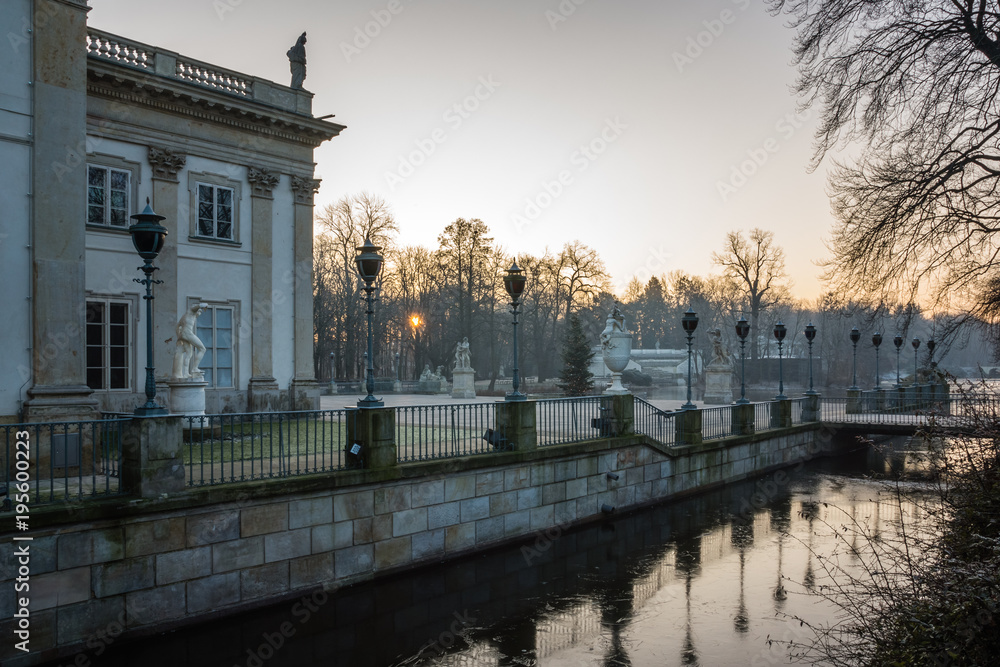 Sunrise over the Royal Palace on the Water in Lazienki Park  in Warsaw, Poland
