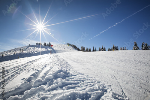 Ski slope in winter sunny day at the mountain ski resort of Alpbachtal, Wildschonau, Austria
