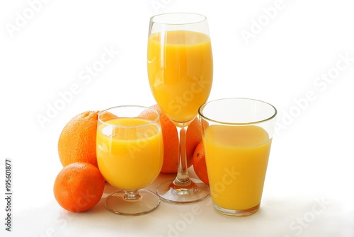 sweet ,juicy oranges and juice as drink