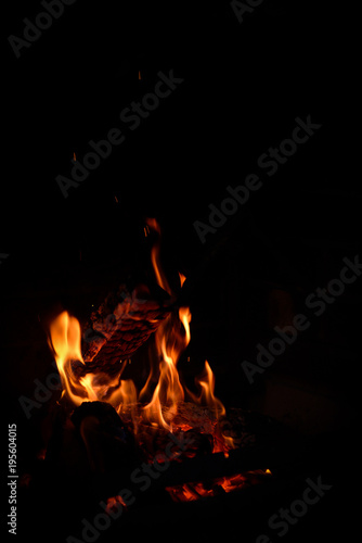 Smoldering ashes of a bonfire. Fire flame in a brick barbecue