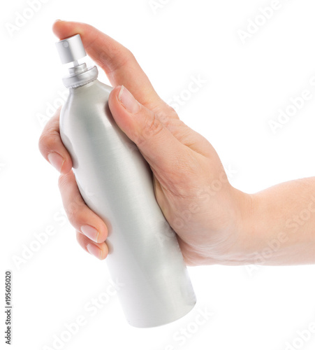 Woman hand with perfume bottle isolated on white background