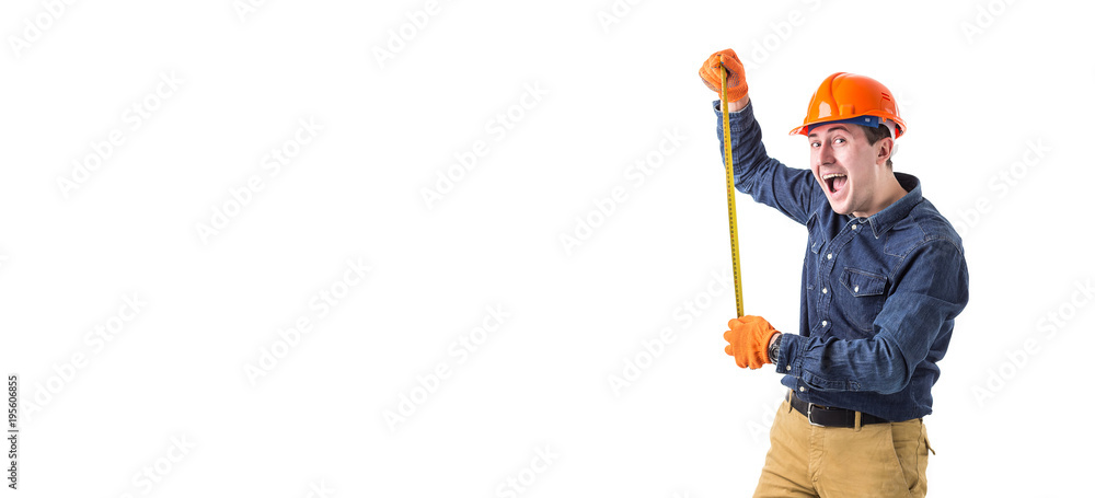 smiling repairman (builder) in helmet and with tape measure in hands isolated on white background with copy space smiling repairman (builder) in helmet and with tape measure in hands isolated on white background with copy space