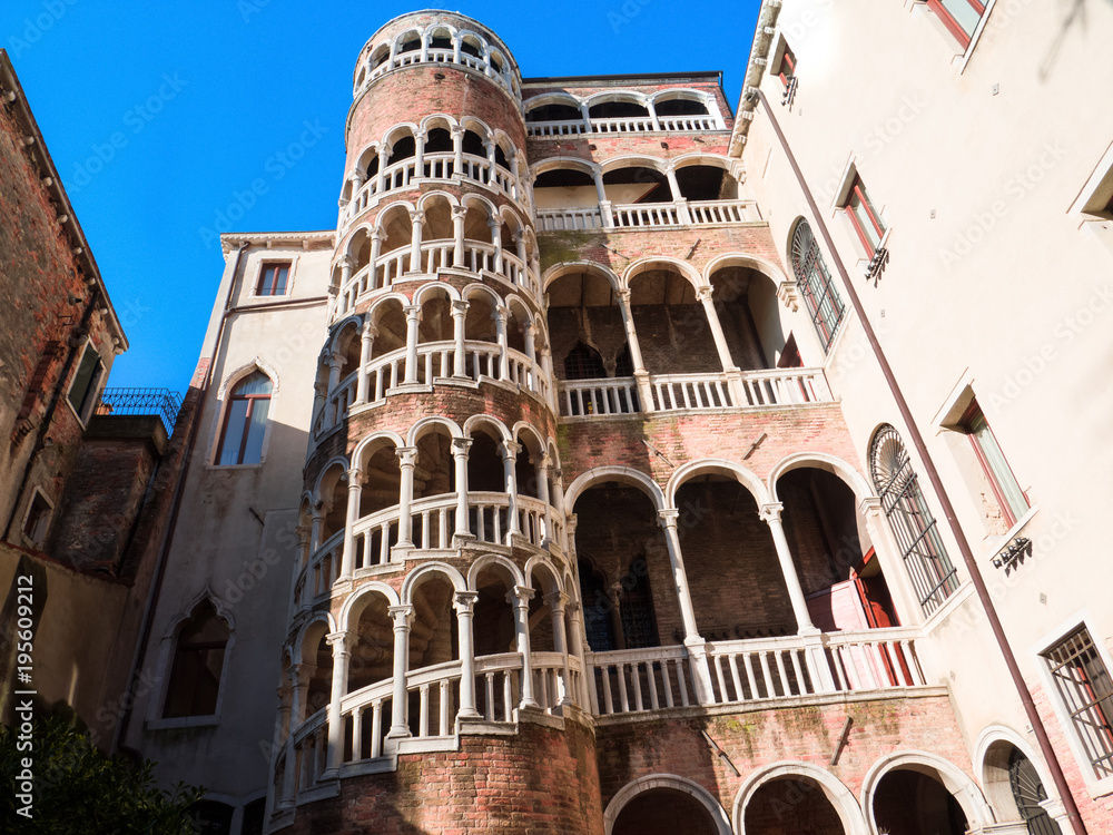 spiral staircase in Renaissance Gothic style in a Venetian palace of the 16th century.Veenice, Italy