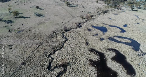 Wetlands and plains with water ways, channels, pits along Thredbo river high in Snowy mountains of Australia.
 photo