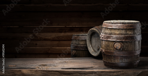 Wine barrel on the old wooden table.